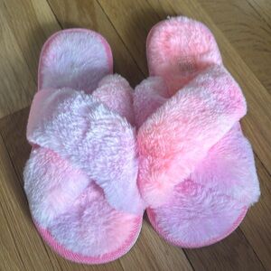 Never worn fuzzy pink and purple slippers